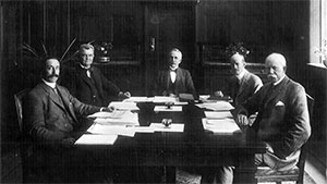 Photograph showing the first meeting of the Notes Board, 17 December 1920