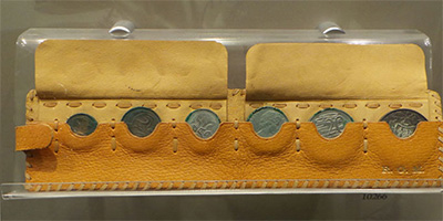 The Royal Australian Mint presented this coin wallet to Prime Minister Menzies (whose initials appear bottom right). Note the 50-cent coin far right, which when first launched was circular and made mostly of silver. Royal Australian Mint
